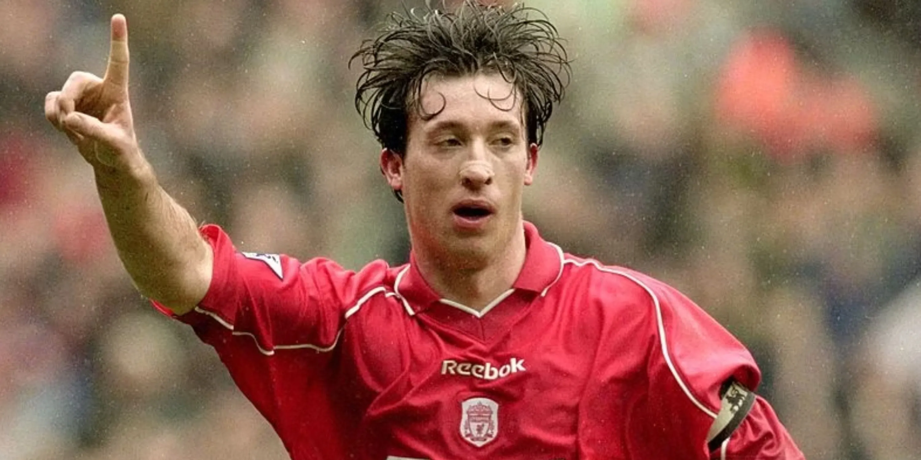 Tiền đạo Robbie Fowler của Liverpool ăn mừng bàn thắng tại Premier League